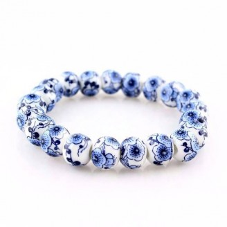 Blue Hibiscus Flowers in White Porcelain Beaded Bracelet